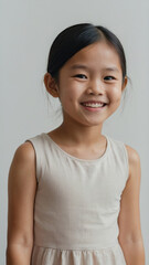 Happy smiling little Asian girl.