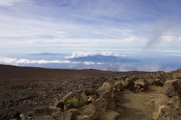 Haleakalā volcanic landscape looking down on the island Maui  