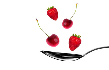 Cherry and strawberry dessert above tea spoon. - 746728361