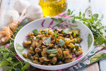 sauteed eggplants witn garlic and mint leaf