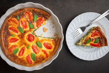 Vegetarian homemade pie, Quiche with tomatoes, spinach and feta cheese, spinach quiche (Turkish...