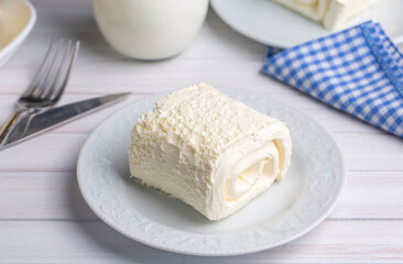 Turkish creamy dairy product. Clotted cream (butter cream) for Turkish breakfast with glass of milk. (Turkish name; kaymak)