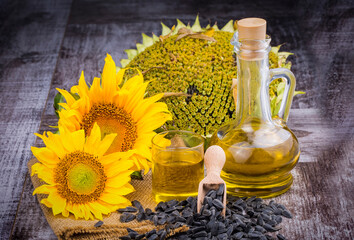 Sunflower, sunflower oil and sunflower seeds, background