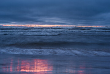 Waves on Baltic sea after sunset.