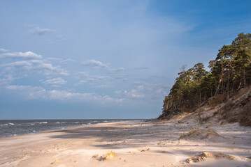 Fototapeta na wymiar Baltic sea beach in Bernati, Latvia on sunny February day