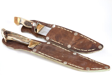 Hunting knife in a leather sheath