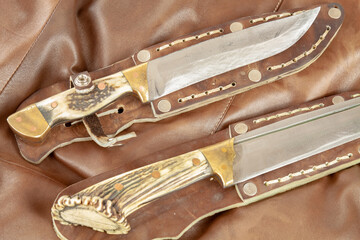 Hunting knife in a leather sheath