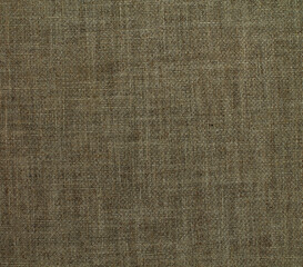 Fototapeta na wymiar Close-up detail of fabric natural color Hemp material pattern design wallpaper. can be used as background or for graphic design. Natural linen material textile canvas Fabric texture background 