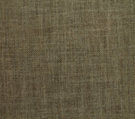 Close-up detail of fabric natural color Hemp material pattern design wallpaper. can be used as background or for graphic design. Natural linen material textile canvas Fabric texture background
