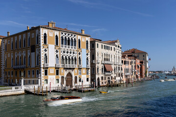 Fototapeta na wymiar Grand Canal, historic decorative tenement houses, floating boats, Venice, Italy