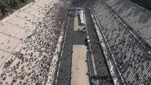 Aerial footage over the finish of a Marathon run, The Authentic in Athens