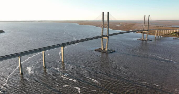 Aerial view of the Sidney Lanier Bridge in Brunswick, Georgia during sunrise.