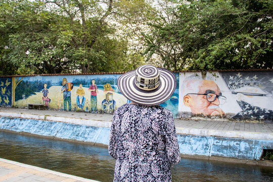 ARACATACA, COLOMBIA - FEBRUARY 2, 2024: Senior woman tourist at the Macondo Linear Park in Aracataca the birthplace of the Colombian Literature Nobel Prize Gabriel Garcia Marquez