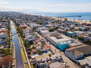 Aerial drone view over Venice Canals Historic District  looking south down the Grand Canal with the...
