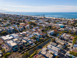 Aerial drone view over Venice Canals Historic District  looking southwest towards the beach and...
