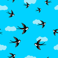 Swallow birds flying in the sky seamless pattern