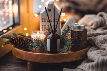 Christmas home aromatherapy. Aroma diffuser with pine extract, organic essential oil, vanilla,...