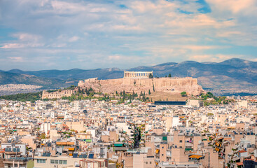 The Acropolis Hill with the Parthenon and the Athens skyline, seen from Kynosargous Hill. Athens,...