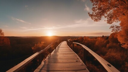 sunrise over the bridge a beautiful panoramic autumn landscape with a wooden path leading to a scenic sunset in the sky   