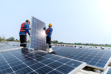 Male workers repair Floating solar panels on water lake. Engineers construct on site Floating solar...