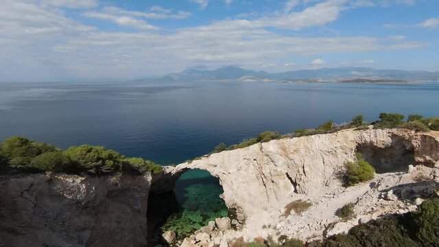 Aerial FPV drone video of the Emerald Cave in Parachora, Corinthia, Greece