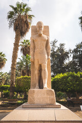 Cairo, Egypt - October 26, 2022. View of the Ramses II Red Granite Statue in the Mit Rahina Museum
