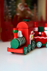 Festive Journey: Toy Train With Santa Claus.
A colorful toy train chugs along with a jolly Santa Claus riding on top, spreading Christmas cheer.