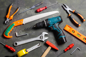 Various repair tools, hardware materials, drill, hammer, pliers, screwdriver, wrench