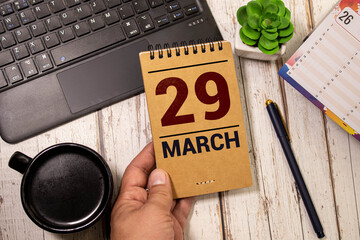 February 29th. Cube calendar for February 29 on wooden surface with copyspace for your text. Leap...