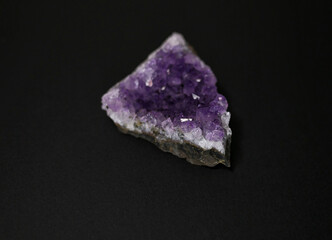 Amethyst druse isolated on black background