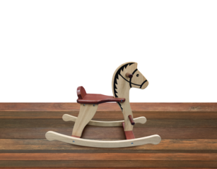 Rocking horse on wooden floor PNG transparent