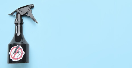 Mosquito repellent on light blue background with space for text