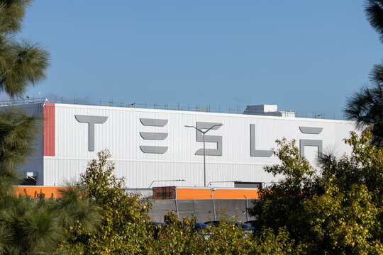Fremont, CA, USA - Feb 21, 2024: Tesla sign is seen at the Tesla Fremont Factory, one of the largest manufacturing sites in California operated by Tesla, Inc.