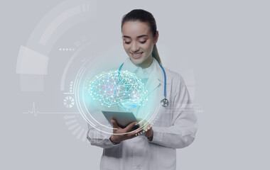 Female doctor with tablet computer on white background