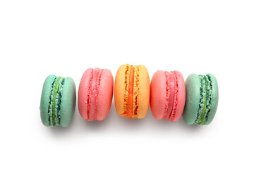 Different tasty sweet macaroons on white background