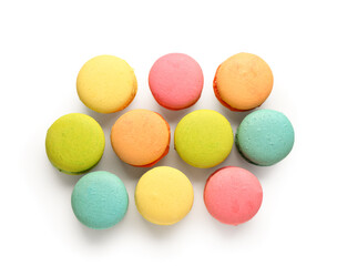 Different tasty sweet macaroons on white background