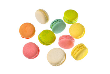 Flying sweet macaroons on white background