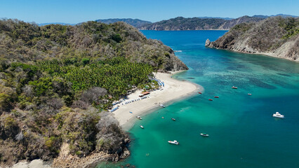 Drone aerial view of Isla Tortuga, tropical paradise beach island in Costa Rica central america Nicoya peninsula