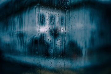 dark blue rainy window