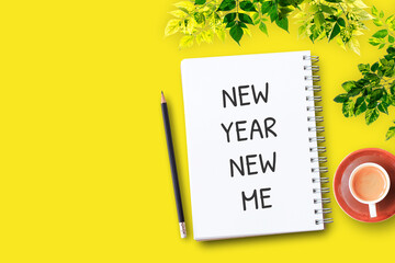 Text with New Year New Me and Red coffee cup on yellow background