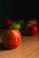 delicious apples on a wooden table