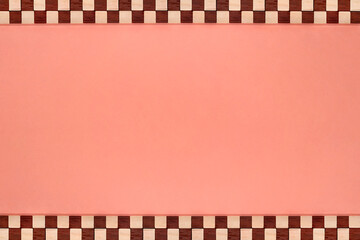 ブロックを並べた赤と白のチェック柄のピンクのラインフレーム