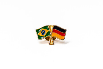 Flags of Brazil and Germany united in a metal pendant