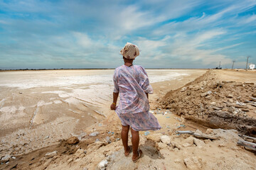 Manaure, Guajira, Colombia. March 4, 2020: Woman walking in the Salinas de Manaure