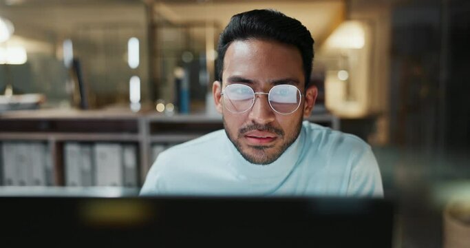 Businessman, night and computer for networking and glasses, reading report and working overtime. Asian male person, planning and research on internet, website and info for deadline on reflection