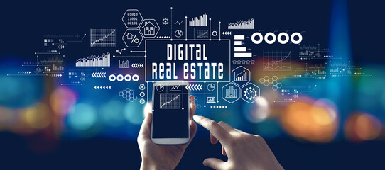 Digital Real Estate concept with person using a smartphone at night