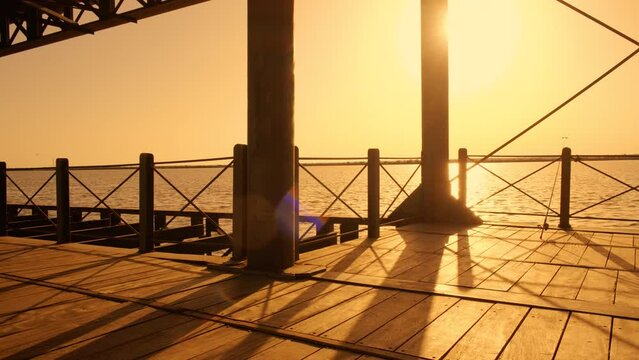 Sunset at Rio Tinto Pier, also known as Muelle de Rio Tinto, Huelva, Andalucia, Spain, commercial pier used for the trade of material from the mines of the Rio Tinto