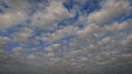 falling rain on sky with clouds - pretty weather background - photo of nature