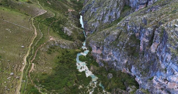 Amazing b&iacute;g shot with drone 4k from the Andes area in Ayacucho Peru, of the famous turquoise Lake Millpu located between mountains in the morning