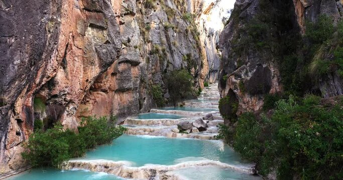 Amazing shot with drone 4k from the Andes area in Ayacucho Peru, of the famous turquoise Lake Millpu located between mountains in morning